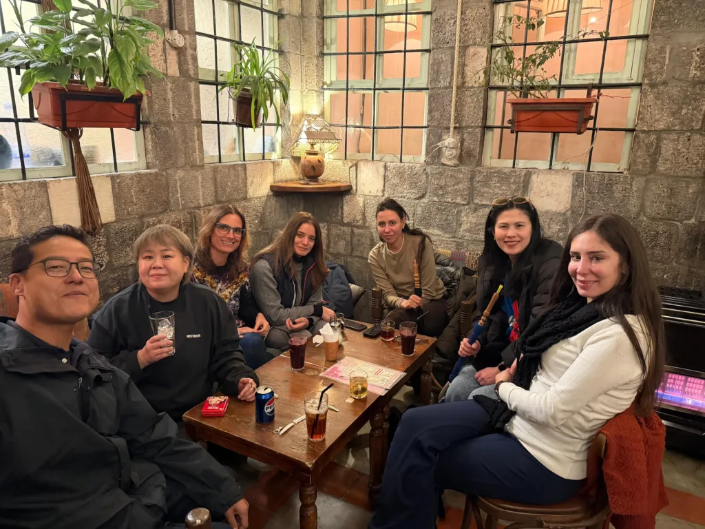 Tourists relaxing in a hidden café in Damascus Old City